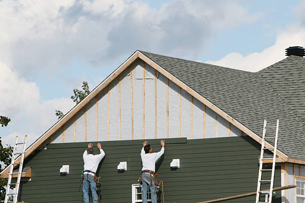 Professional Storm Damage Siding Repair technician working in Temperanceville, VA